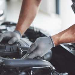 auto-mechanic-working-garage-repair-service_146671-18358